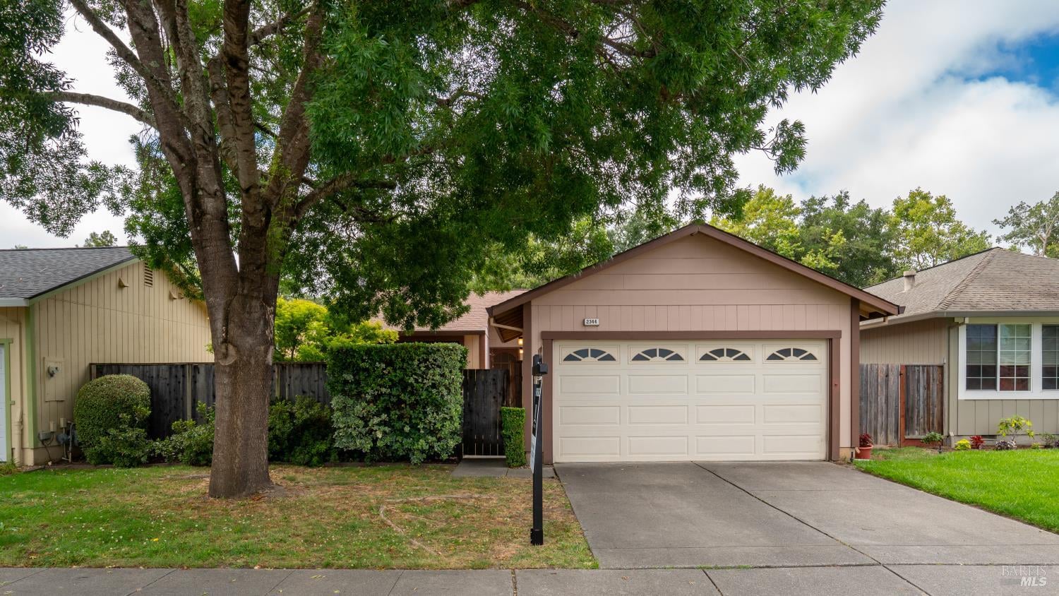 Welcome to 2344 Gads Hill Street, walk through the gate to your own private oasis.